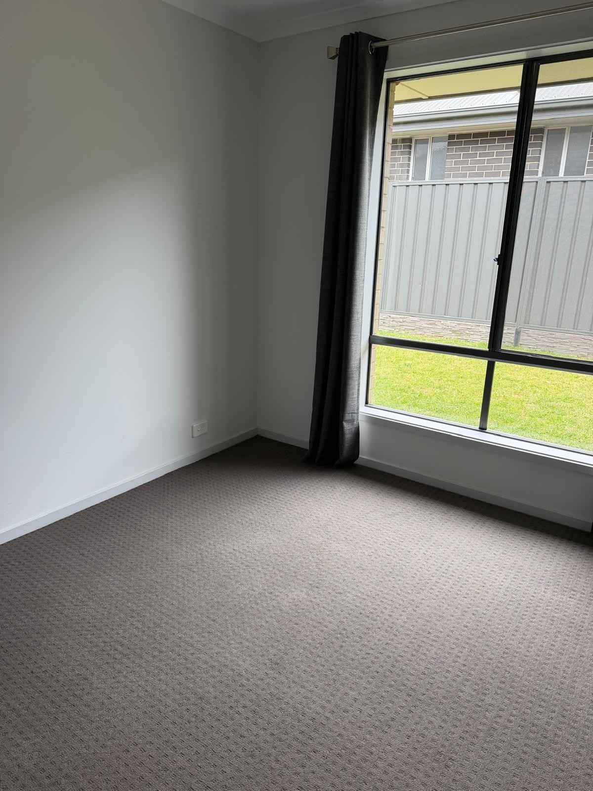Vacuumed bedroom carpet after end of lease clean - Adelaide