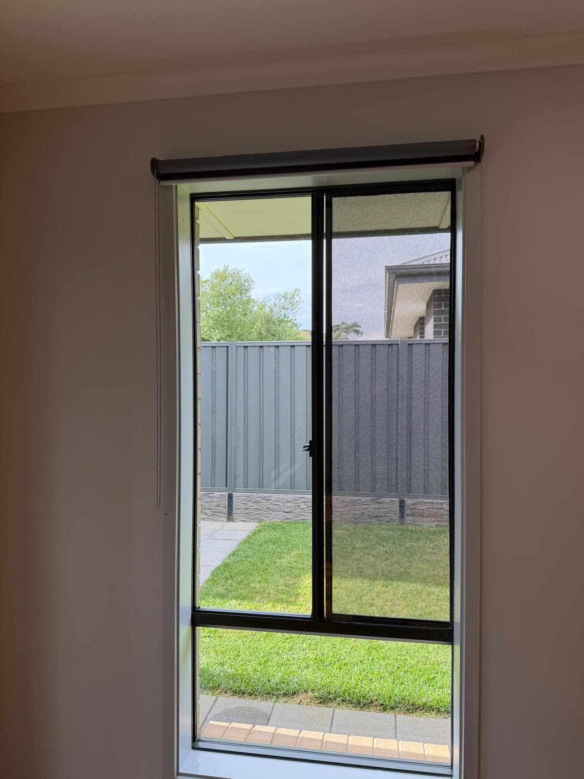 Clean bedroom window and roller blind - end of lease clean Adelaide