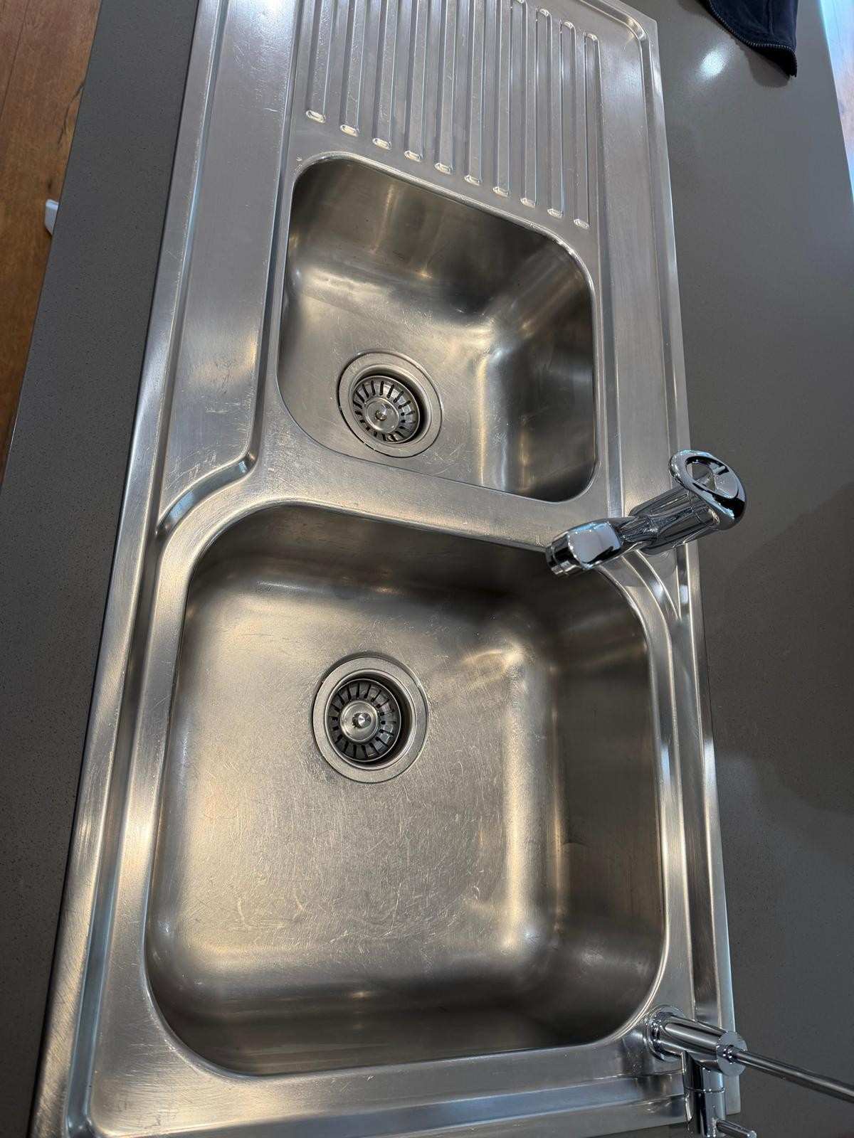 Polished stainless steel double kitchen sink - end of lease clean Adelaide