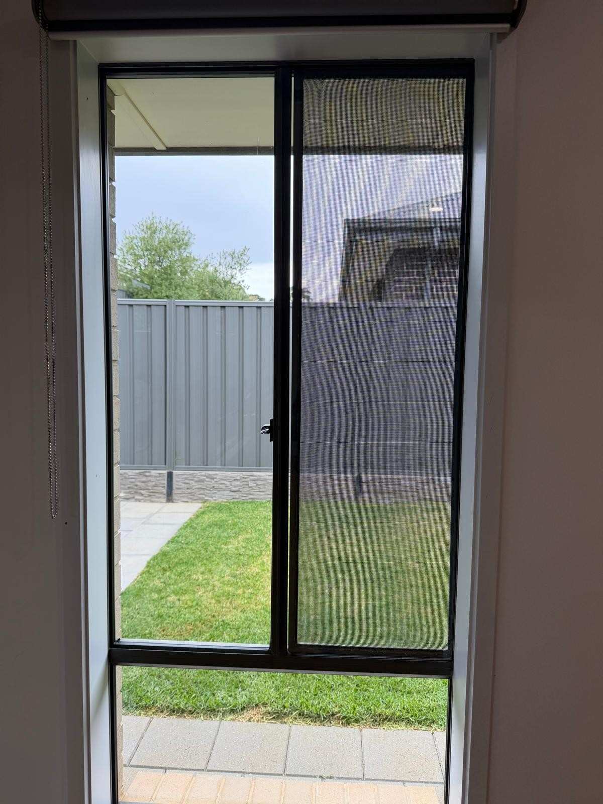 Clean sliding glass door and fly screen - end of lease clean Adelaide