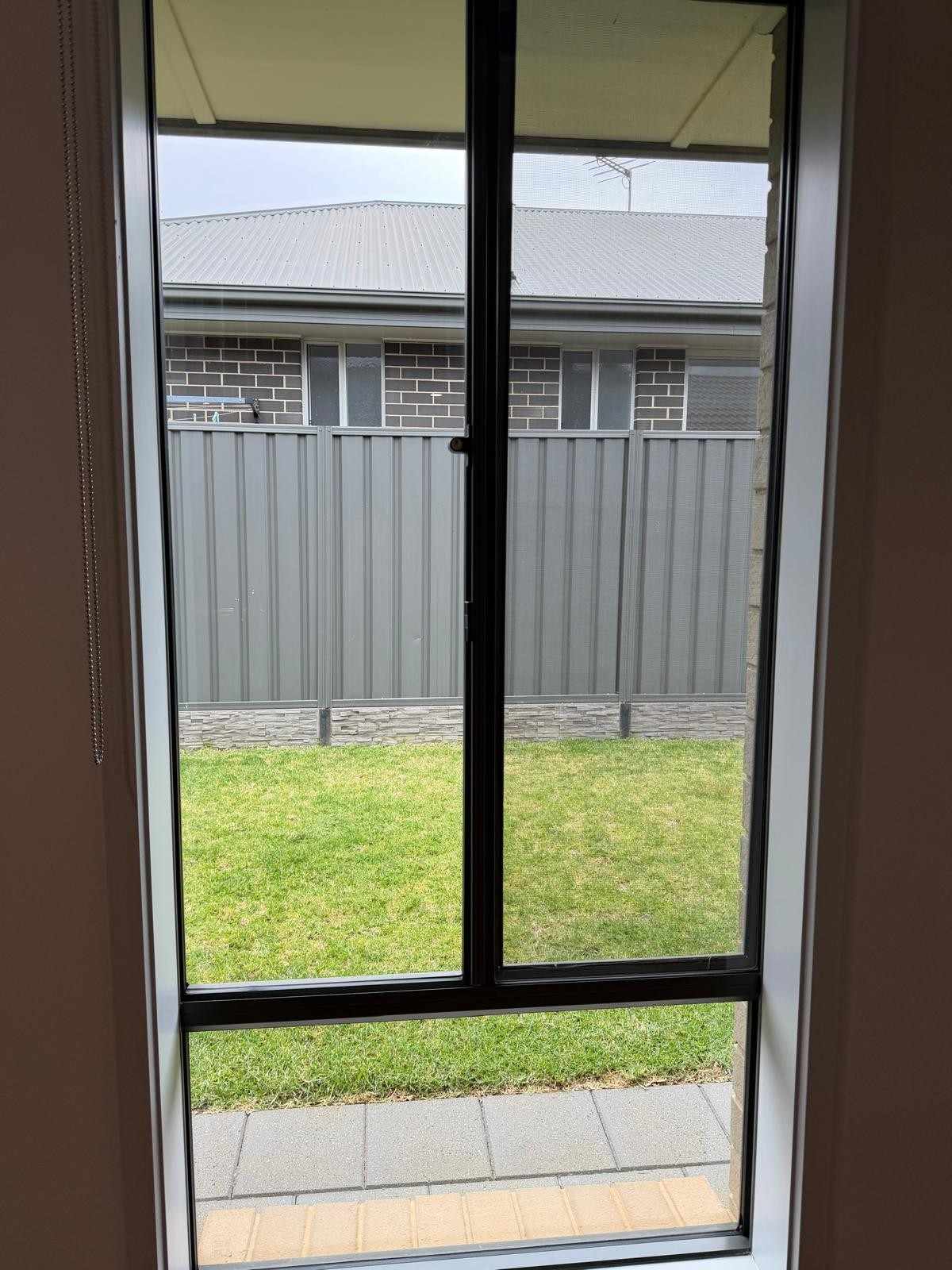 Spotless interior window after professional clean - Adelaide Scrubhubb